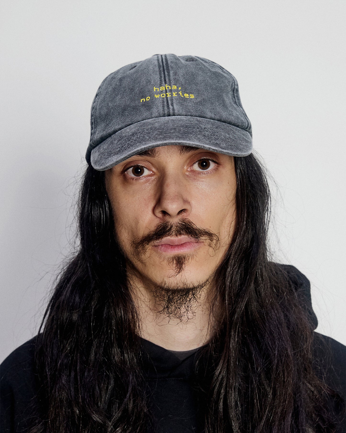 Lubalin modeling the "haha, no worries" cap